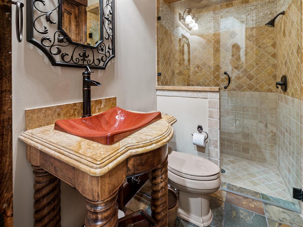 2115 Paradise Rnch Trail McKinney, TX 75071 - Photo 8 of 40 a bathroom with a sink a toilet and shower