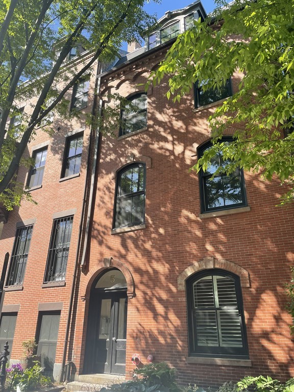 5 Dwight Street, Unit 1 Boston, MA 02118 - Photo 1 of 22 a front view of a house