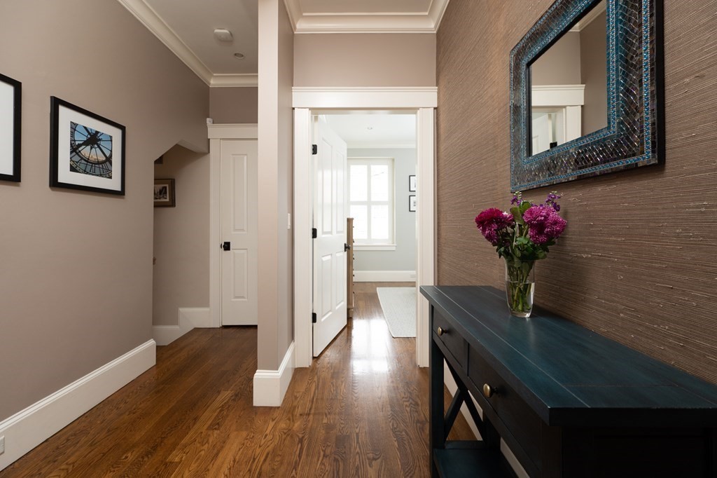 5 Dwight Street, Unit 1 Boston, MA 02118 - Photo 12 of 22 a dining room with furniture and wooden floor