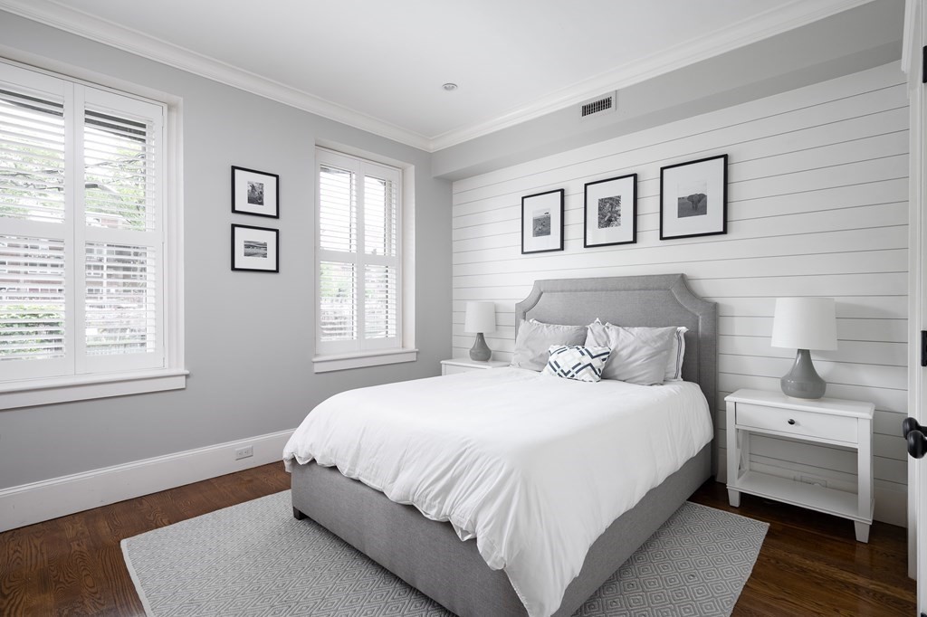 5 Dwight Street, Unit 1 Boston, MA 02118 - Photo 13 of 22 a bedroom with a bed and a window