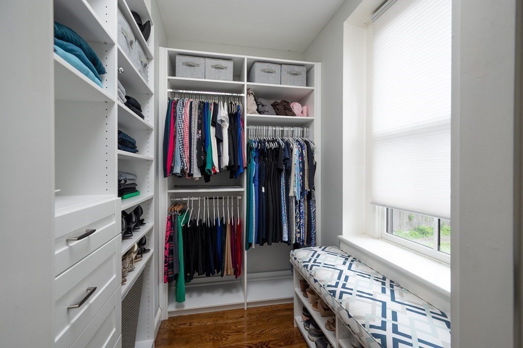 5 Dwight Street, Unit 1 Boston, MA 02118 - Photo 14 of 22 a view of walk in closet with clothes and shoes