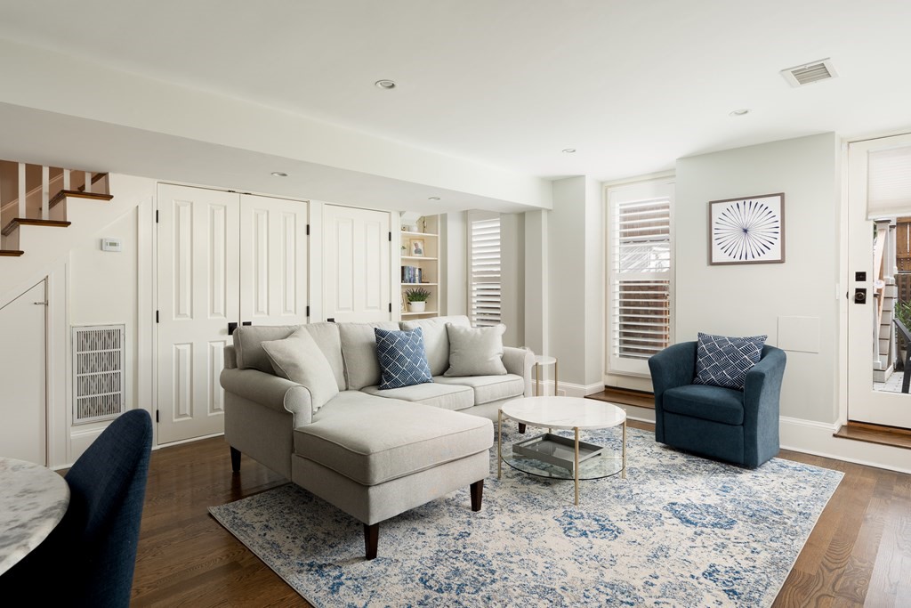 5 Dwight Street, Unit 1 Boston, MA 02118 - Photo 3 of 22 a living room with furniture and a couch