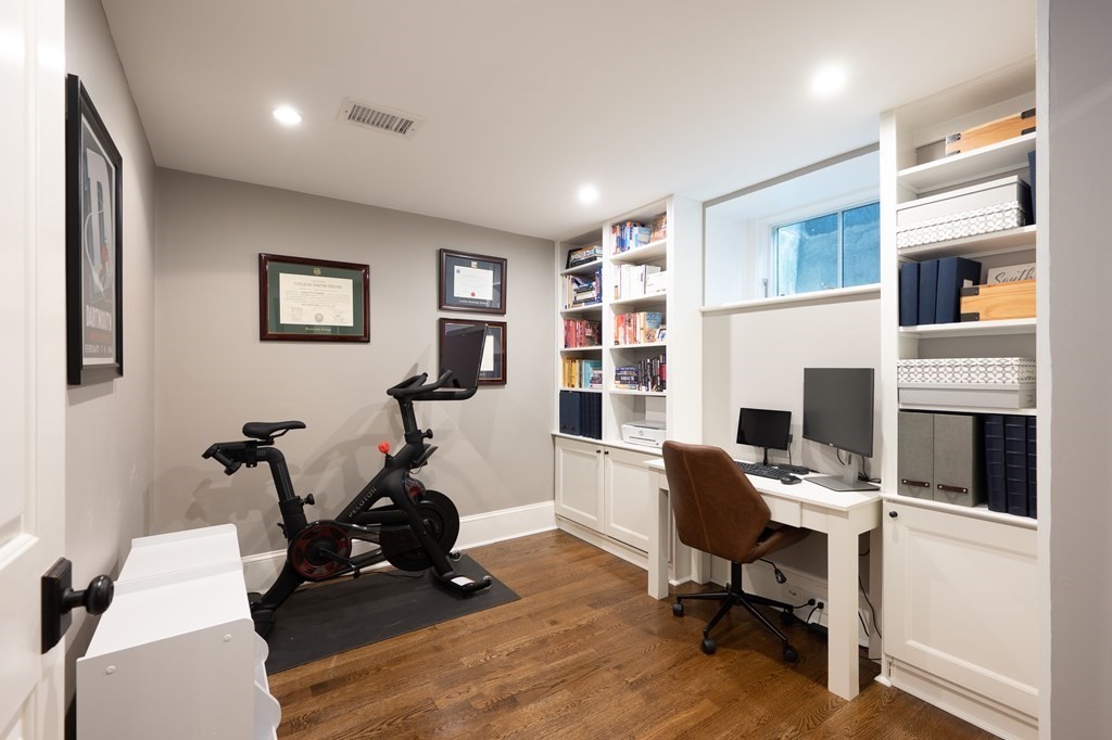 5 Dwight Street, Unit 1 Boston, MA 02118 - Photo 10 of 22 a view of a livingroom with workspace and a couch