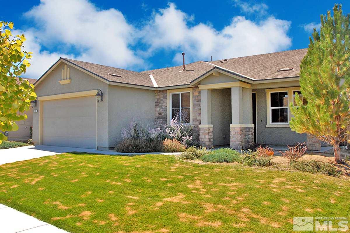 9085 Yeager Street Reno, NV 89506 - Photo 1 of 1 a front view of a house with a yard