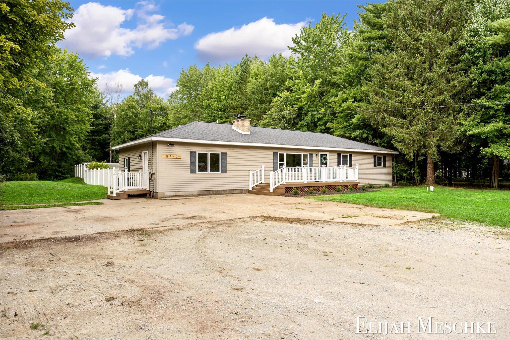 3240 East Riley-Thompson Road Twin Lake, MI 49457 - Photo 3 of 43 04-K1J10455