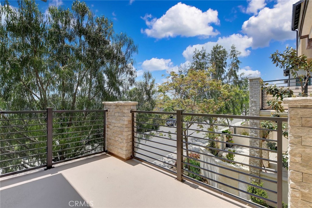 711 Brooklyn Drive Brea, CA 92821 - Photo 11 of 30 a view of a balcony with floor to ceiling windows and wooden fence