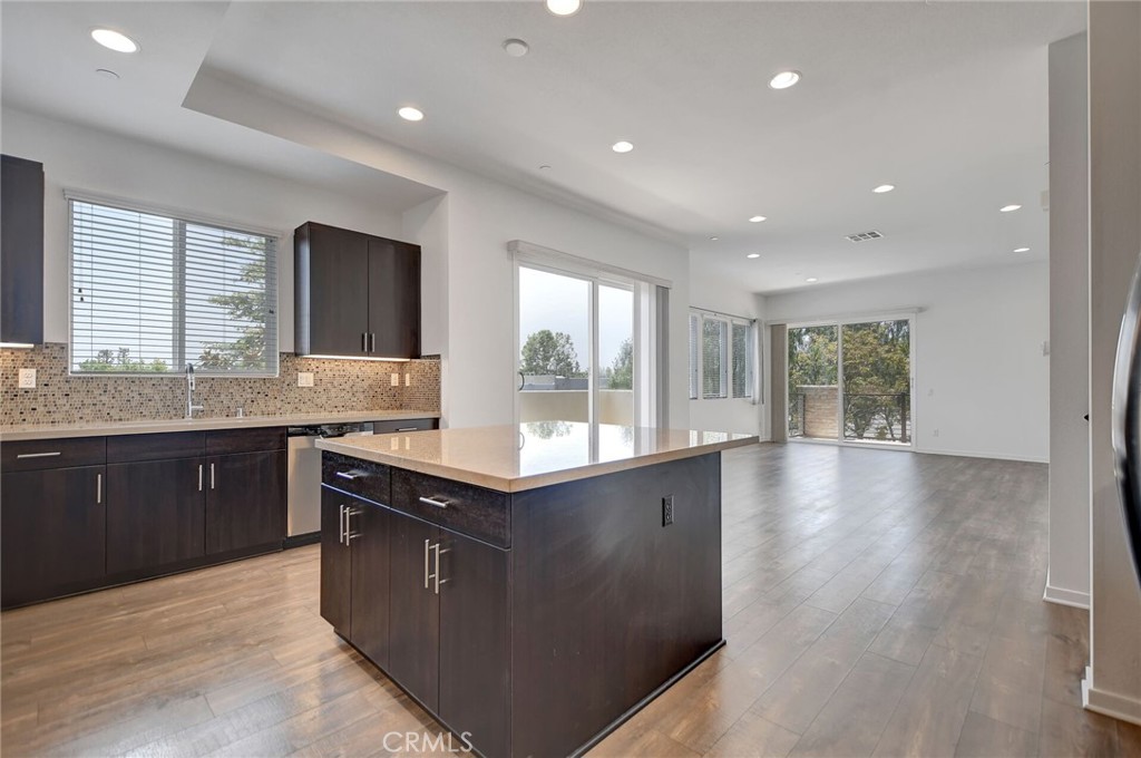 711 Brooklyn Drive Brea, CA 92821 - Photo 17 of 30 a kitchen with granite countertop a sink and cabinets