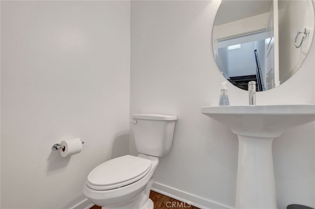 711 Brooklyn Drive Brea, CA 92821 - Photo 19 of 30 a white toilet sitting next to a white sink