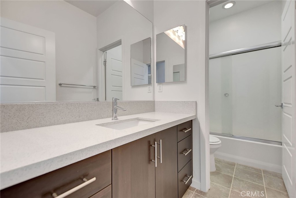 711 Brooklyn Drive Brea, CA 92821 - Photo 22 of 30 a bathroom with a sink and a mirror