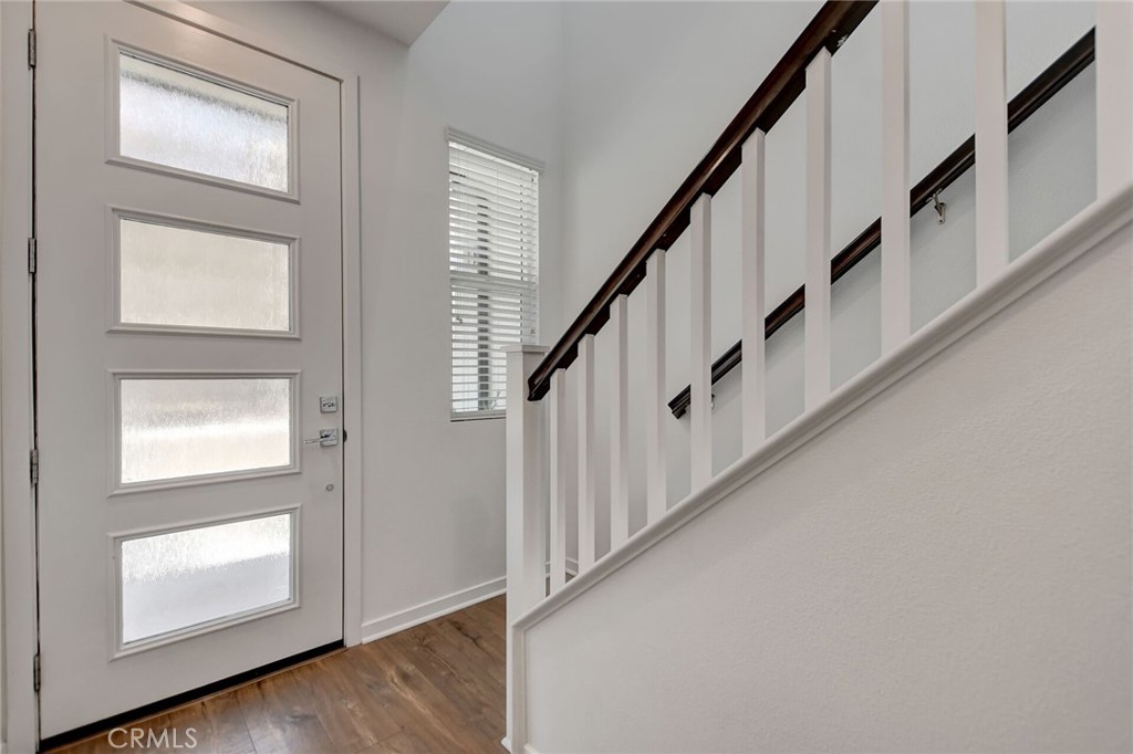 711 Brooklyn Drive Brea, CA 92821 - Photo 4 of 30 a view of staircase with wooden floor and staircase