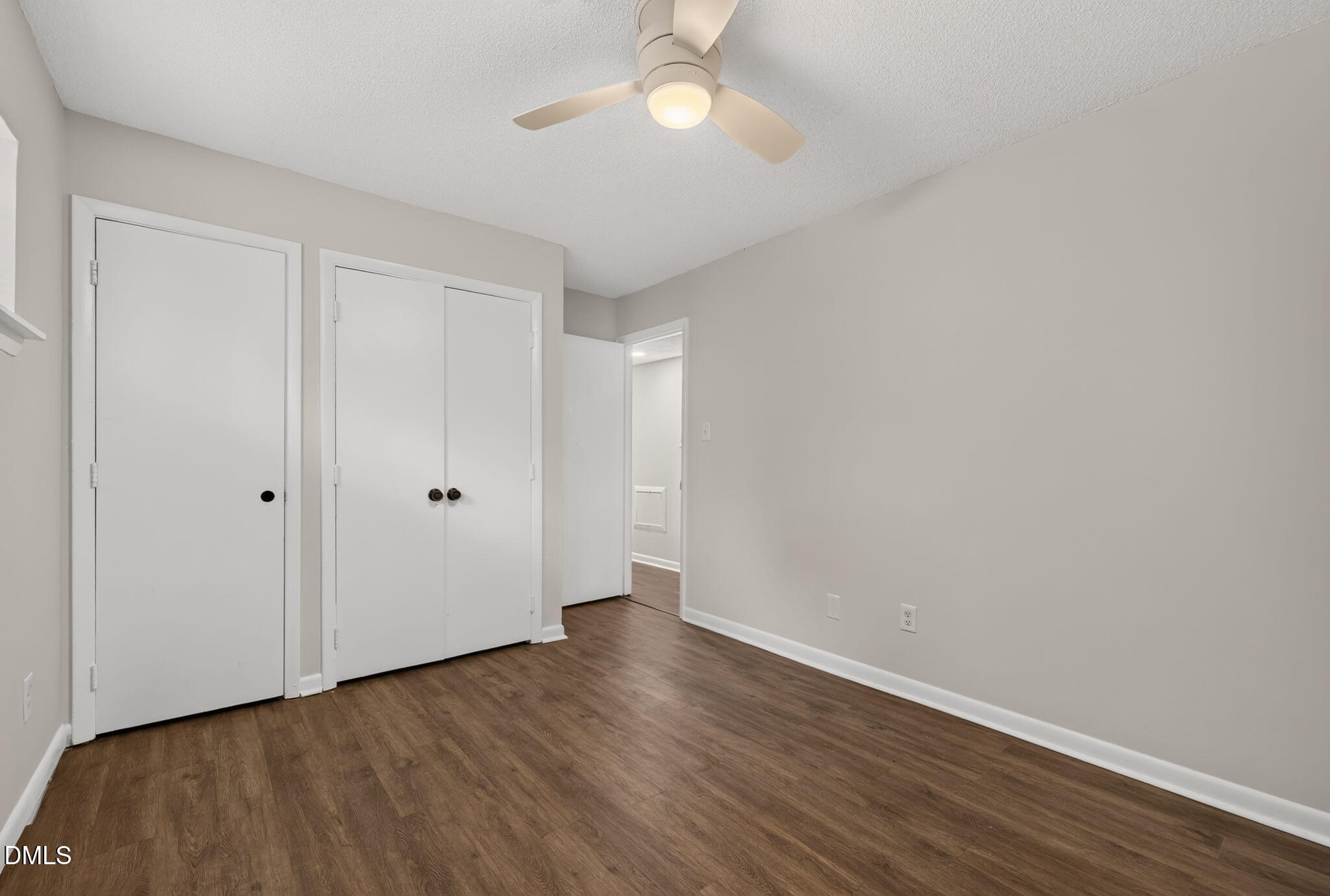 546 Pine Ridge Place Raleigh, NC 27609 - Photo 15 of 21 a view of an empty room with wooden floor