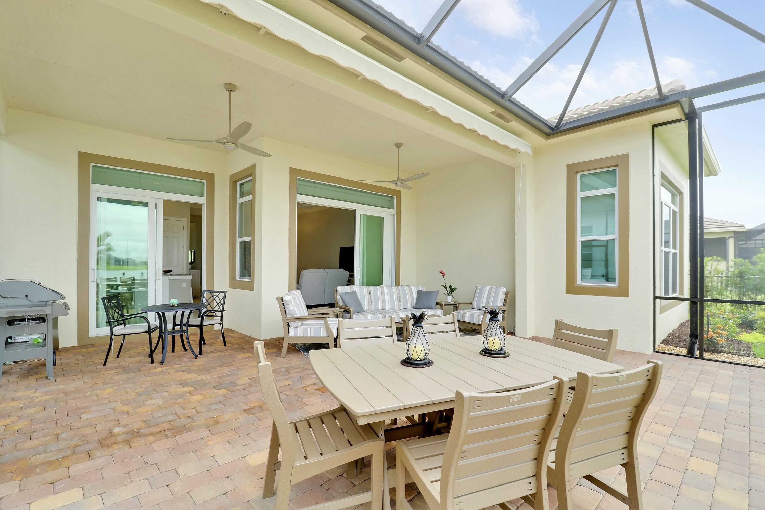 9182 Southwest Pepoli Way Port St. Lucie, FL 34987 - Photo 37 of 80 Extended Screened Lanai