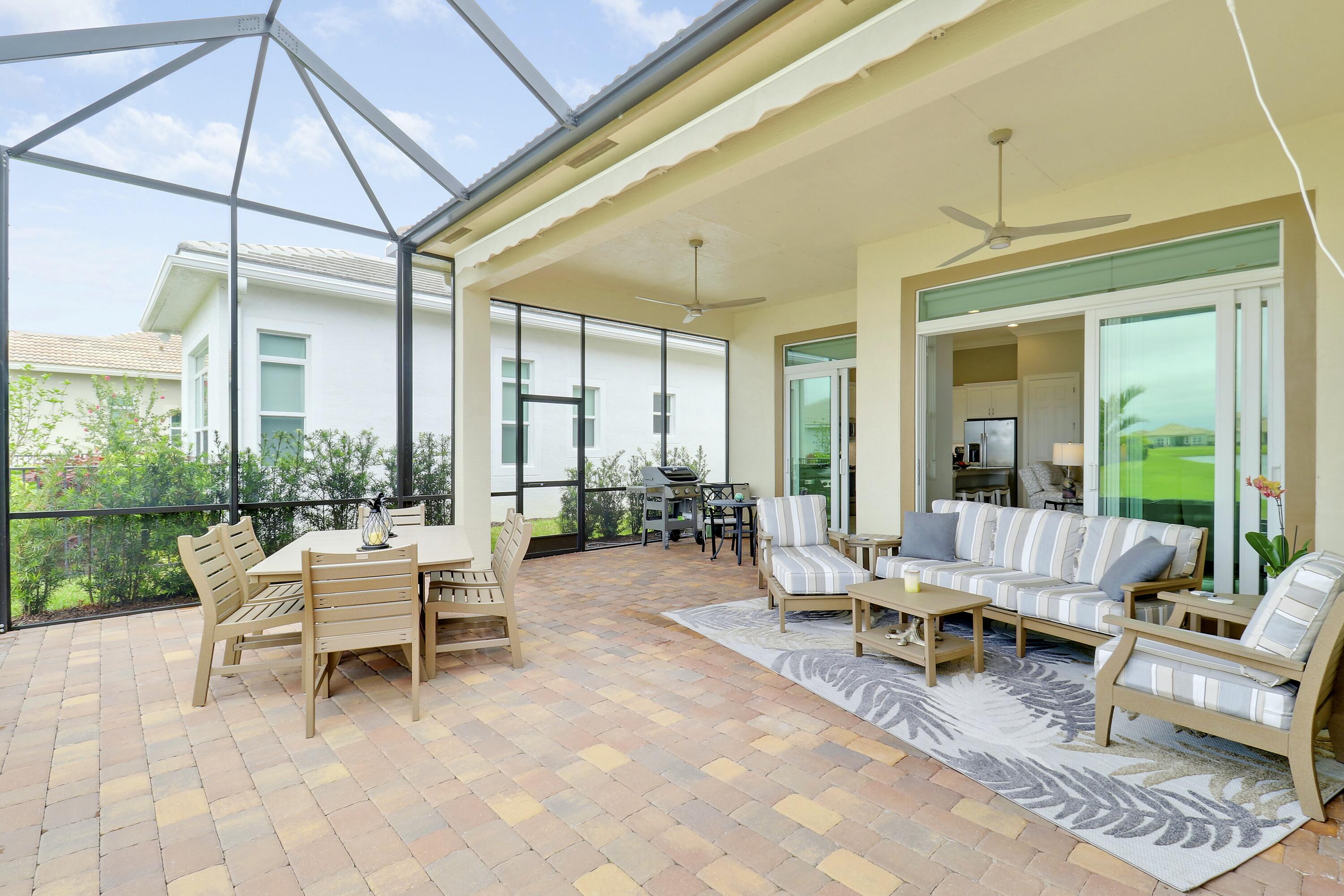 9182 Southwest Pepoli Way Port St. Lucie, FL 34987 - Photo 38 of 80 Extended Screened Lanai