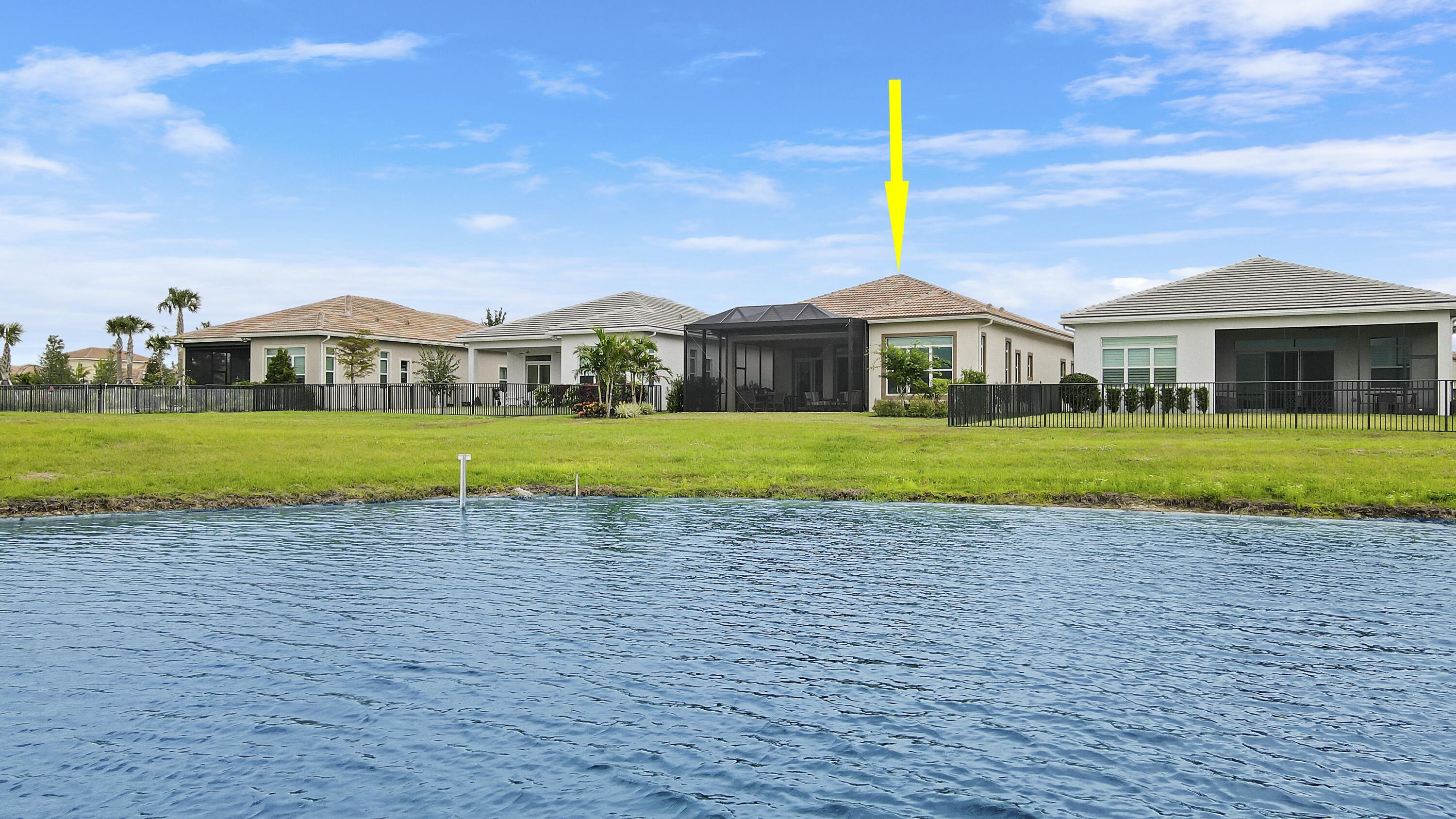 9182 Southwest Pepoli Way Port St. Lucie, FL 34987 - Photo 43 of 80 a front view of a house with a yard