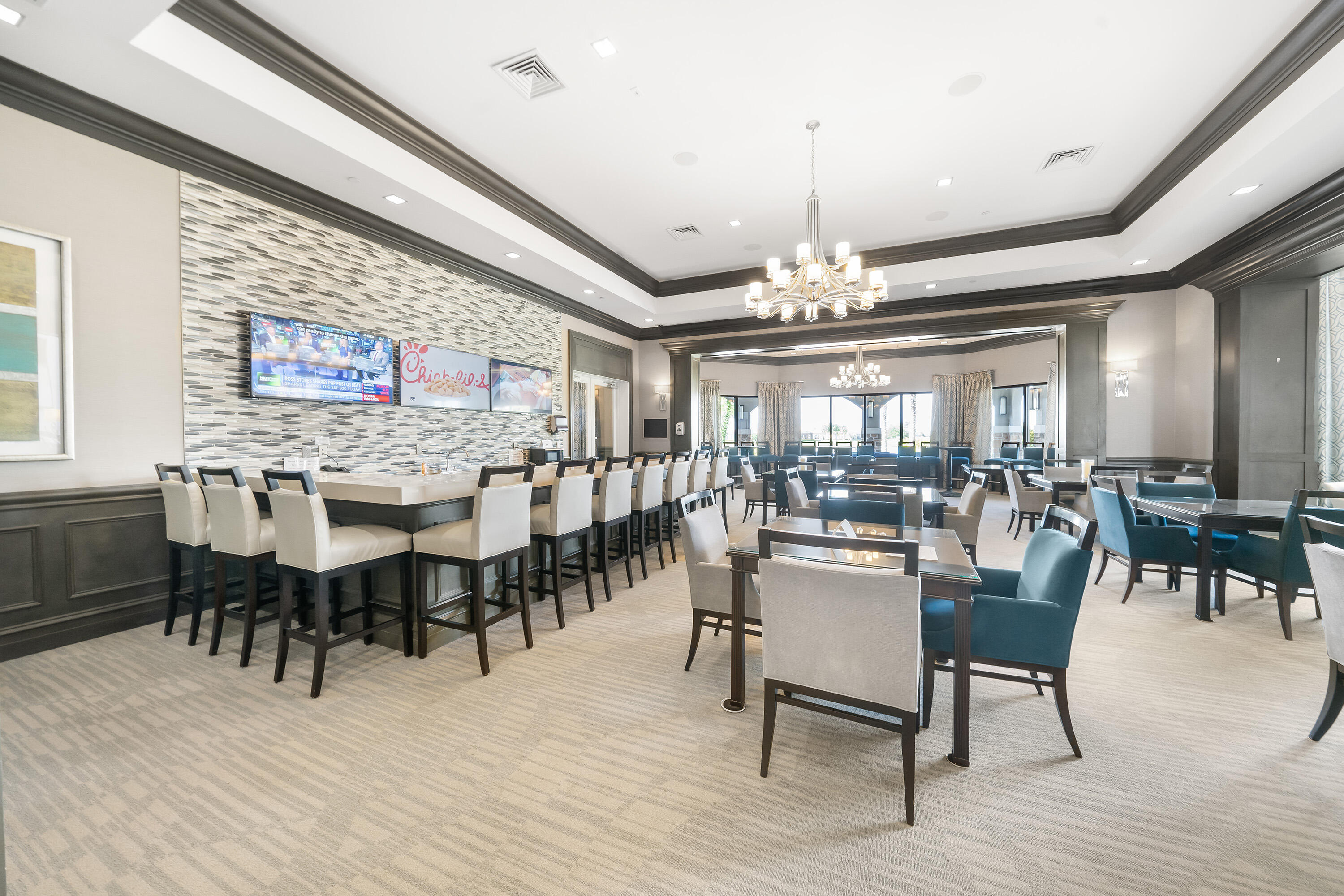 9182 Southwest Pepoli Way Port St. Lucie, FL 34987 - Photo 56 of 80 a view of a dining room with furniture window and wooden floor
