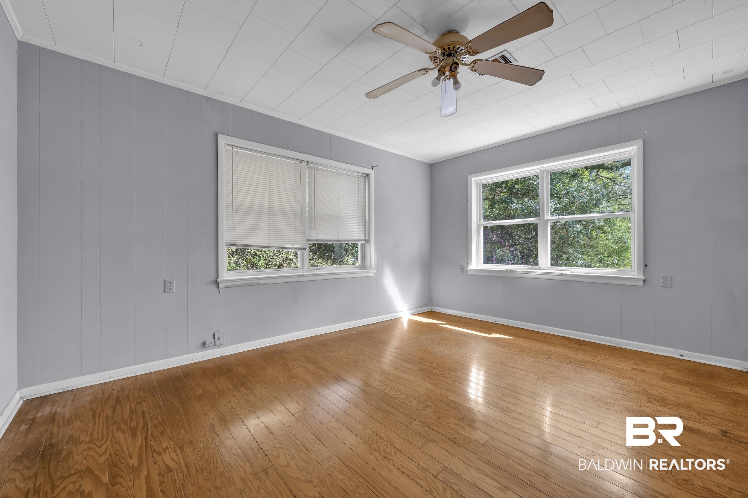 17463 Highway 98 Foley, AL 36535 - Photo 15 of 57 Spare room with hardwood / wood-style flooring and ceiling fan