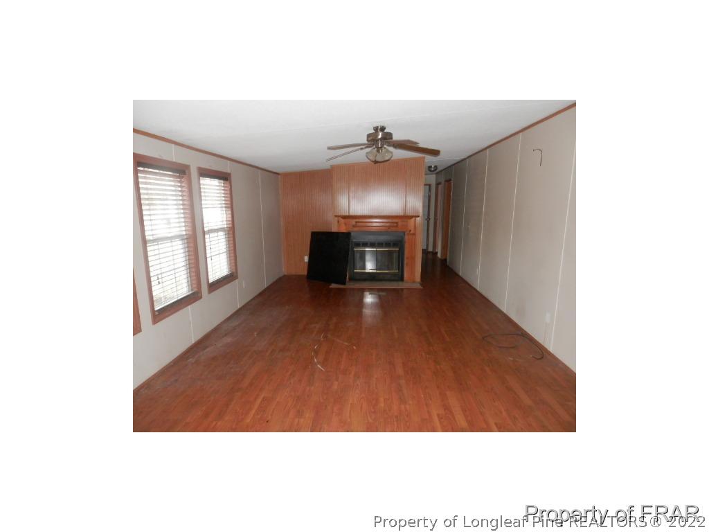 833 Fred Hall Road Stedman, NC 28391 - Photo 6 of 14 a view of an empty room with a window