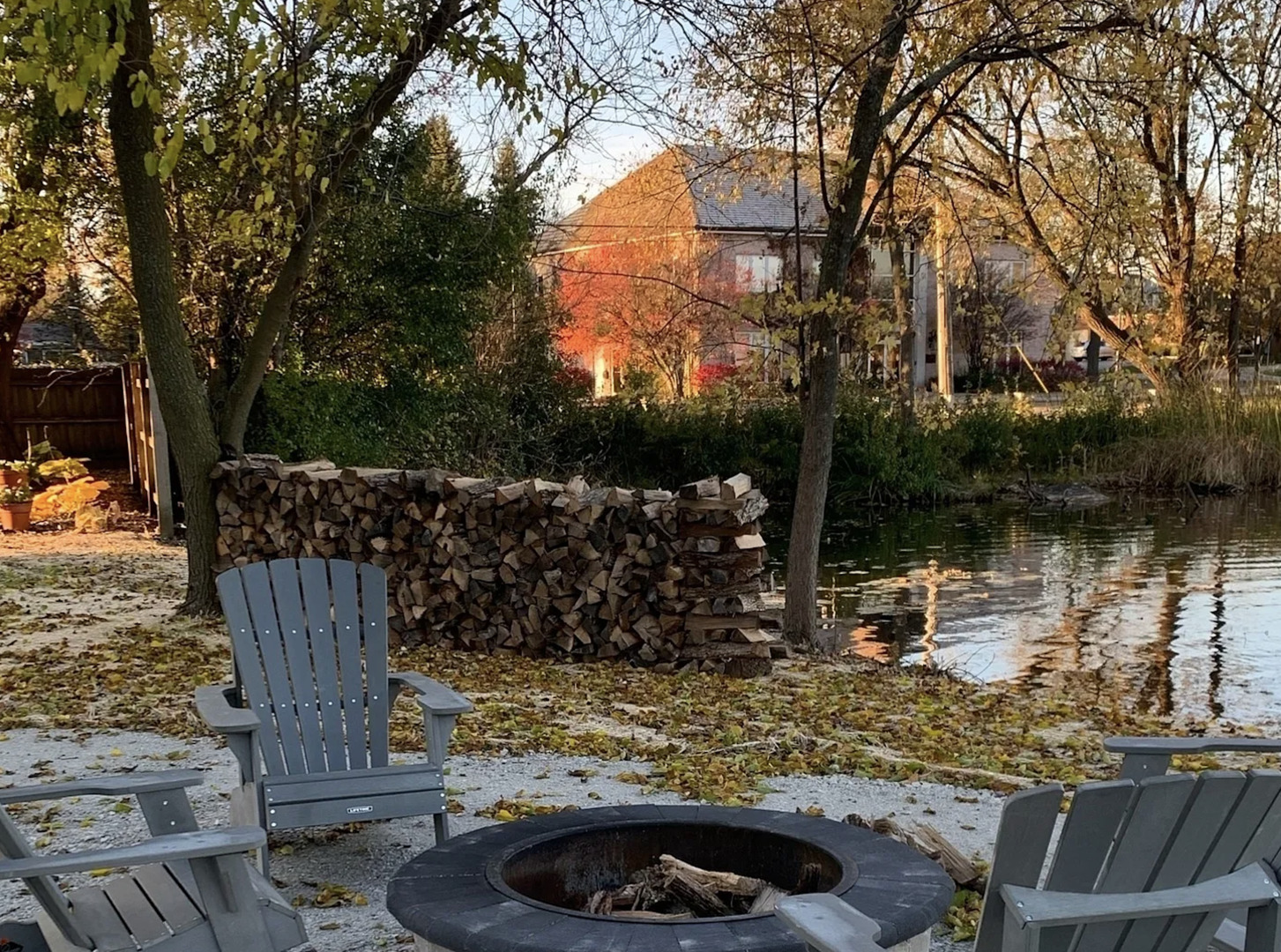 84 West Belvidere Road, Unit 203 Grayslake, IL 60030 - Photo 15 of 15 a view of a wooden house with a yard
