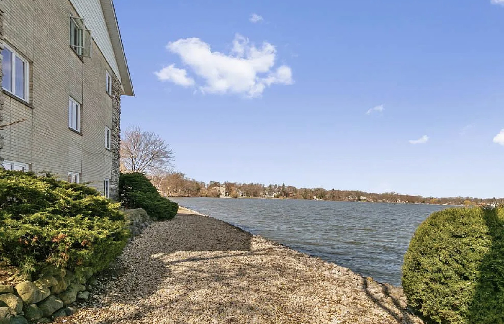 84 West Belvidere Road, Unit 203 Grayslake, IL 60030 - Photo 2 of 15 a view of a lake and mountain