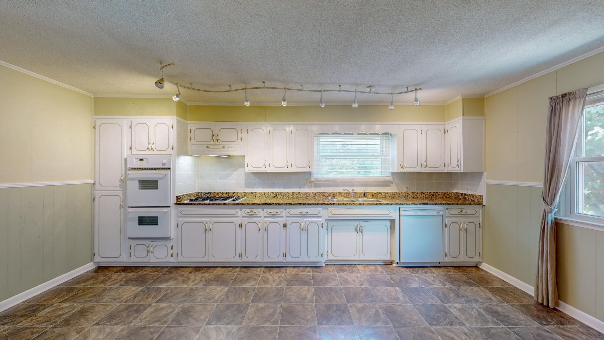 428 Caldwell Road Southeast Cleveland, TN 37323 - Photo 26 of 91 a kitchen with stainless steel appliances granite countertop a refrigerator and a stove top oven