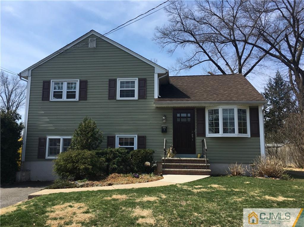 3 Wynn Road Edison, NJ 08817 - Photo 1 of 13 front view of a house with a yard