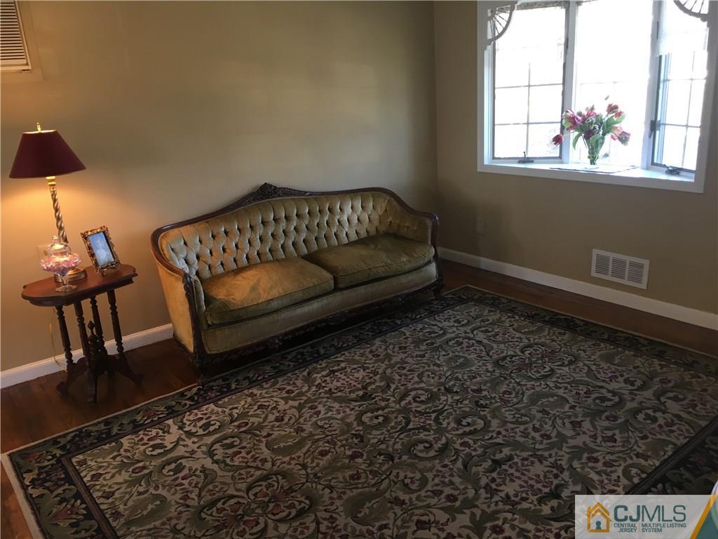 3 Wynn Road Edison, NJ 08817 - Photo 2 of 13 a living room with furniture and a window