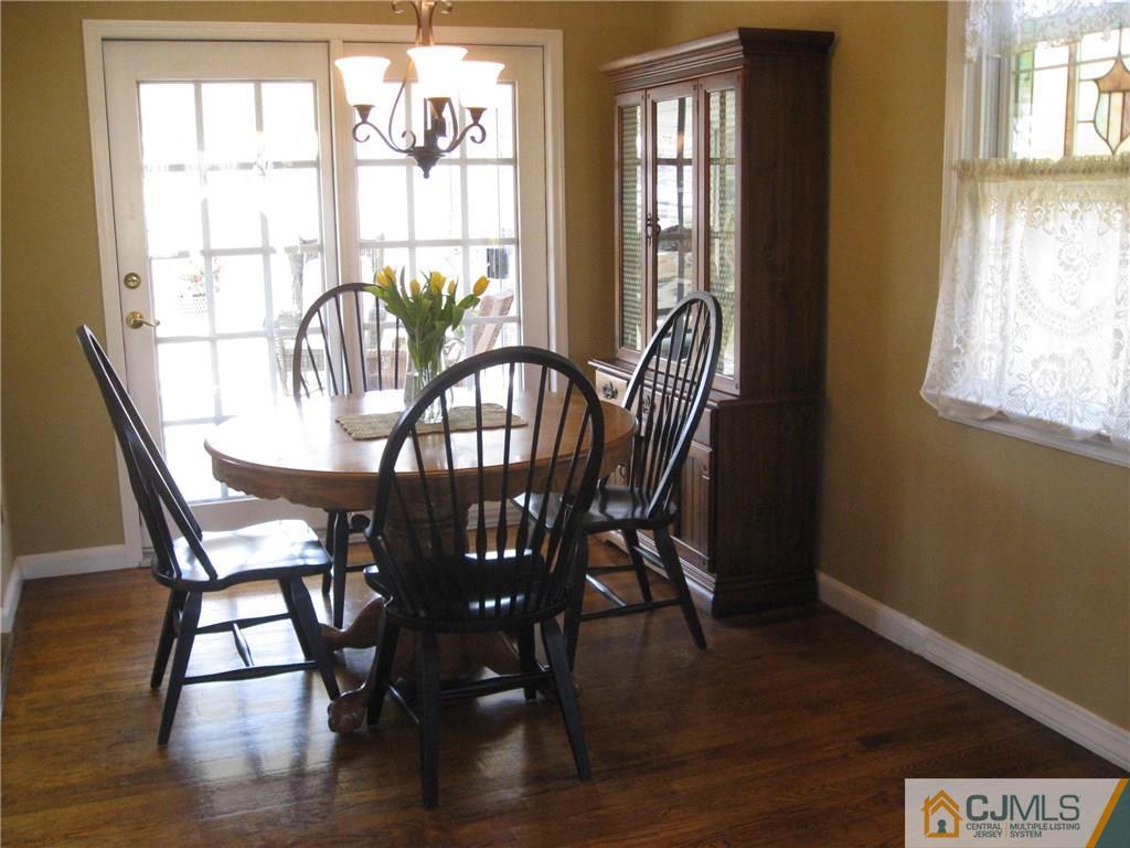 3 Wynn Road Edison, NJ 08817 - Photo 4 of 13 a view of a dining room with furniture and windows