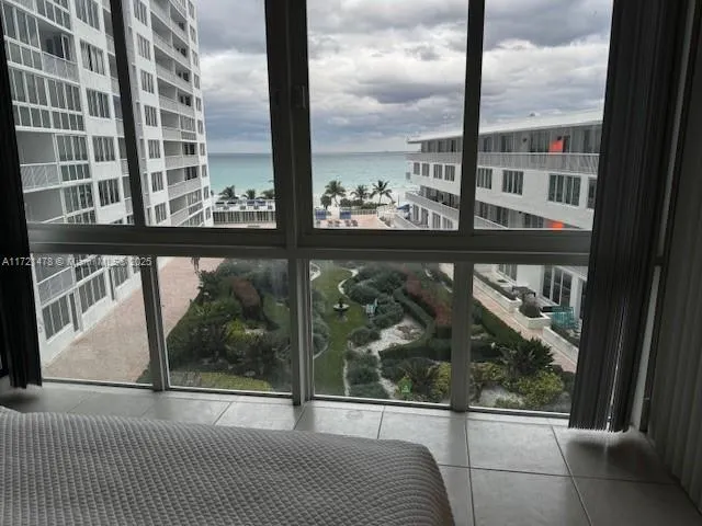 a view of a glass door with balcony