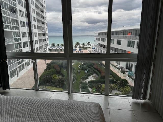 5401 Collins Avenue, Unit 430 Miami Beach, FL 33140 - Photo 33 of 52 a view of a glass door with balcony