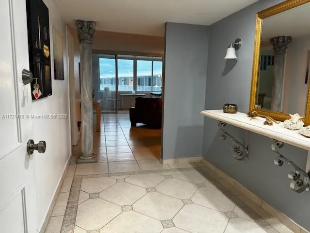a bathroom with a sink and mirror