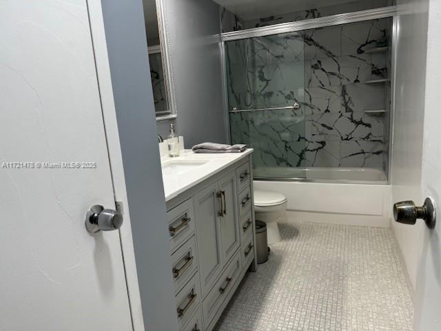 5401 Collins Avenue, Unit 430 Miami Beach, FL 33140 - Photo 42 of 52 a bathroom with a sink a toilet and shower