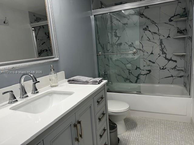 5401 Collins Avenue, Unit 430 Miami Beach, FL 33140 - Photo 43 of 52 a bathroom with a sink toilet vanity and shower