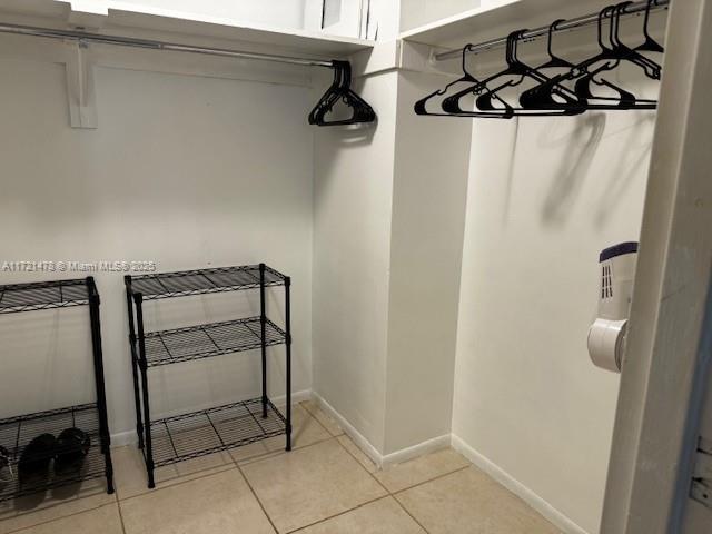 5401 Collins Avenue, Unit 430 Miami Beach, FL 33140 - Photo 48 of 52 a view of a walk in closet
