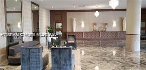 5401 Collins Avenue, Unit 430 Miami Beach, FL 33140 - Photo 10 of 52 a bathroom with sinks mirror and vanity