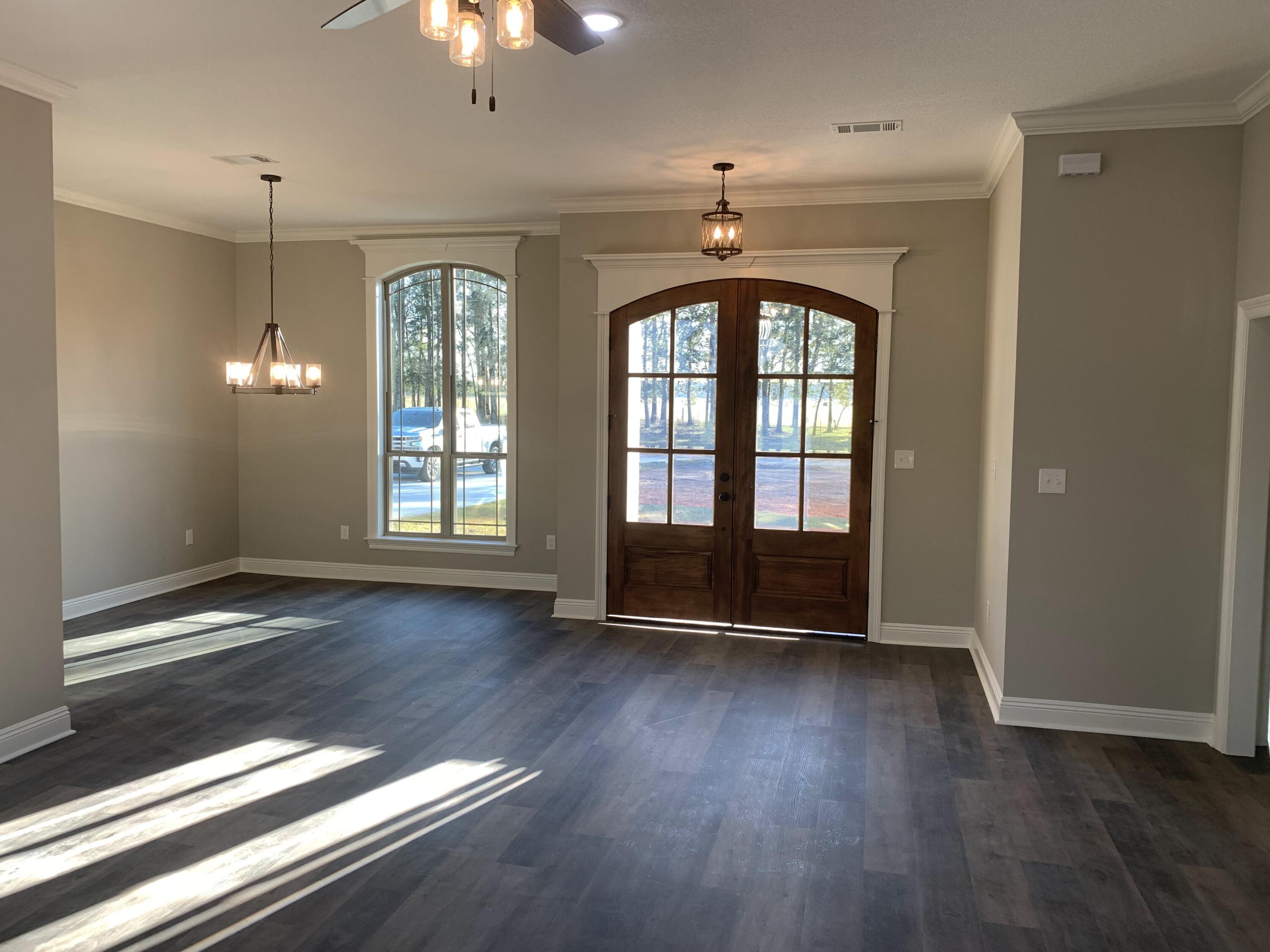 17065 Old Joe Moran Road Kiln, MS 39556 - Photo 11 of 28 Living Room to entry & dining room
