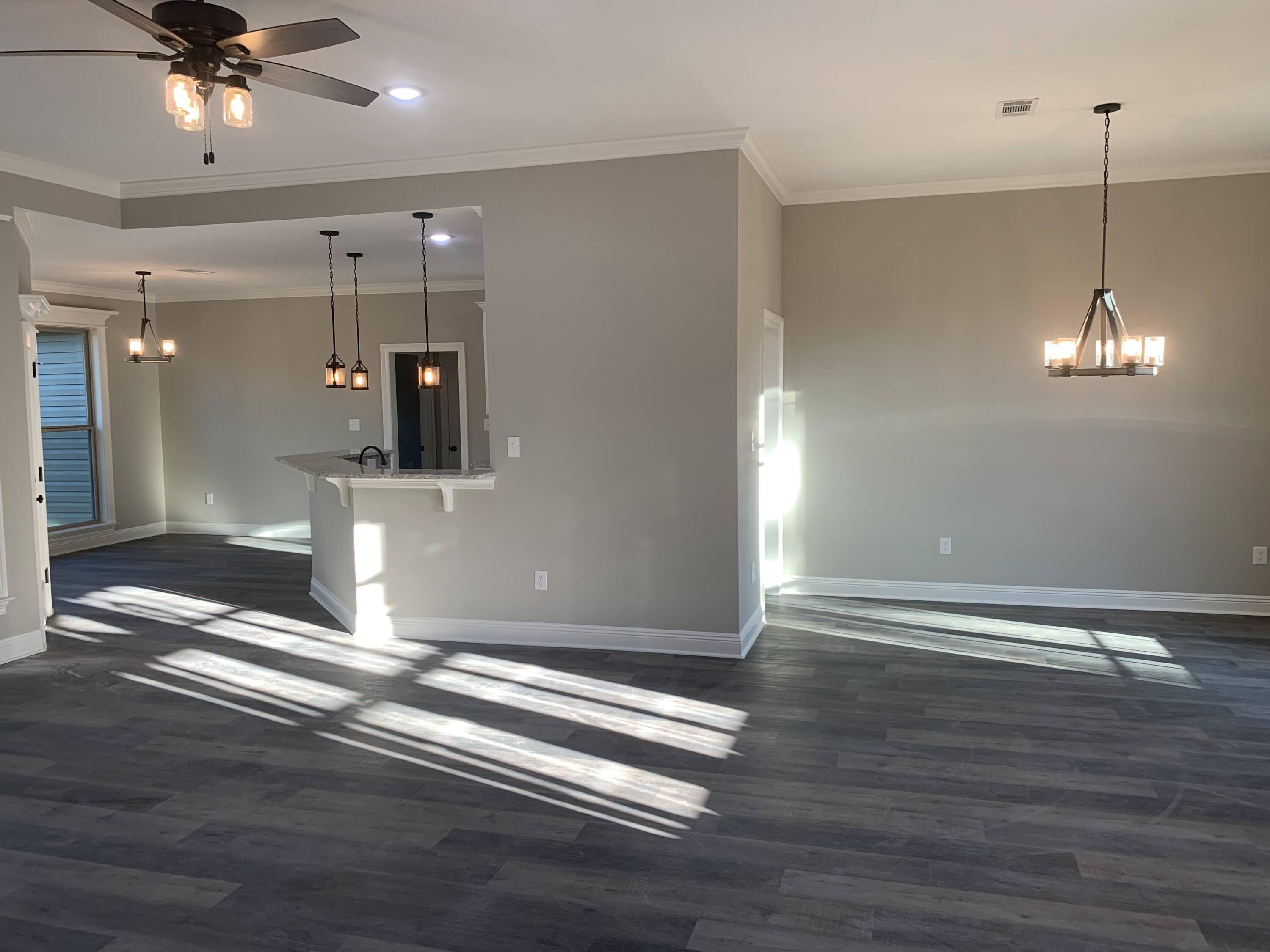 17065 Old Joe Moran Road Kiln, MS 39556 - Photo 12 of 28 Living Room to kitchen & dining room