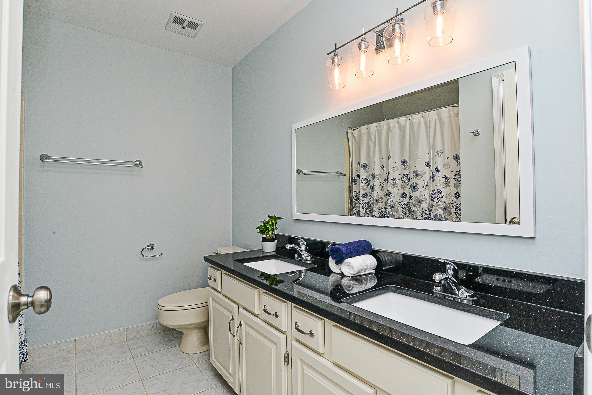 9106 Scott Street Springfield, VA 22153 - Photo 24 of 34 Tastefully updated upper level hall bath