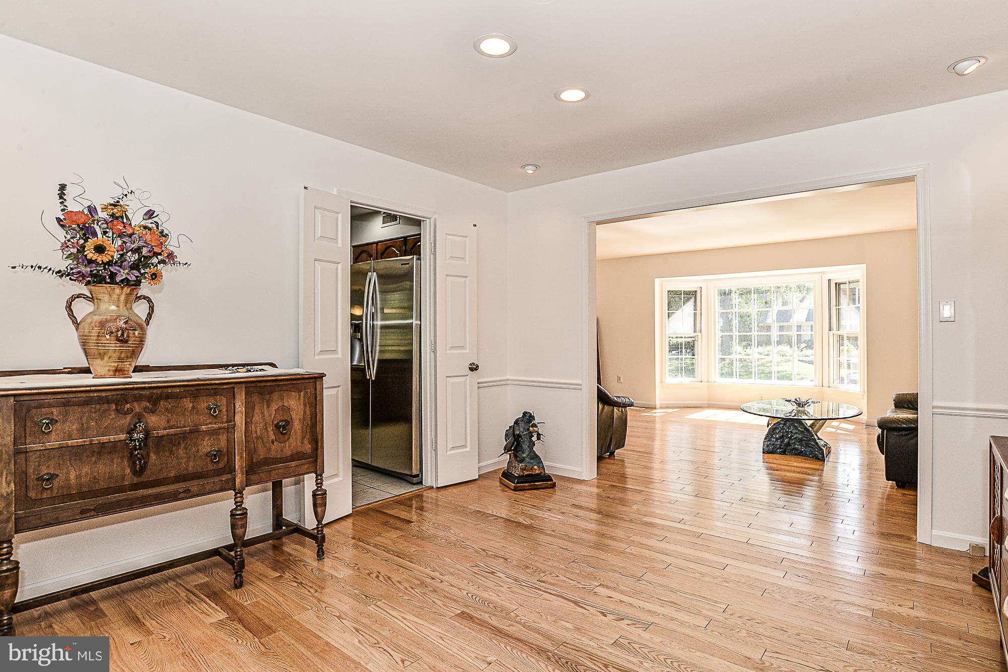 9106 Scott Street Springfield, VA 22153 - Photo 6 of 34 Recessed lighting & french doors in dining room