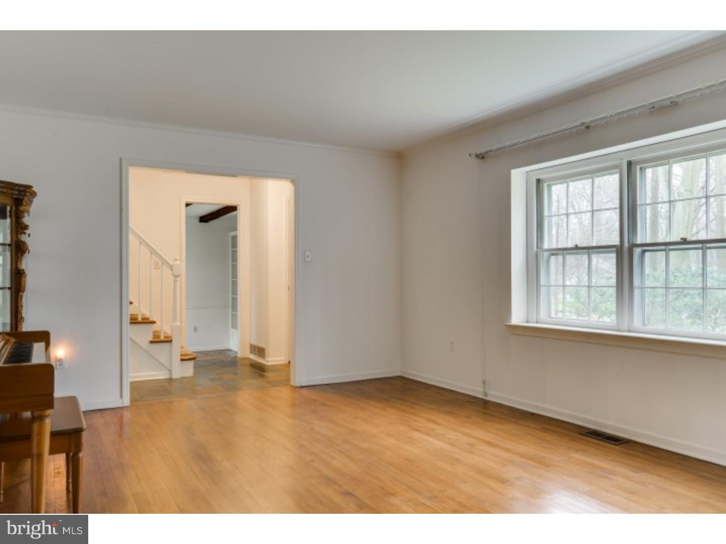 20 Sunset Road Lawrence Township, NJ 08648 - Photo 12 of 25 an empty room with wooden floor and windows