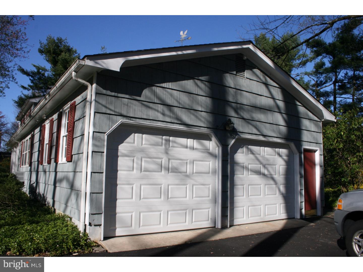 20 Sunset Road Lawrence Township, NJ 08648 - Photo 20 of 25 a front view of a house with a yard