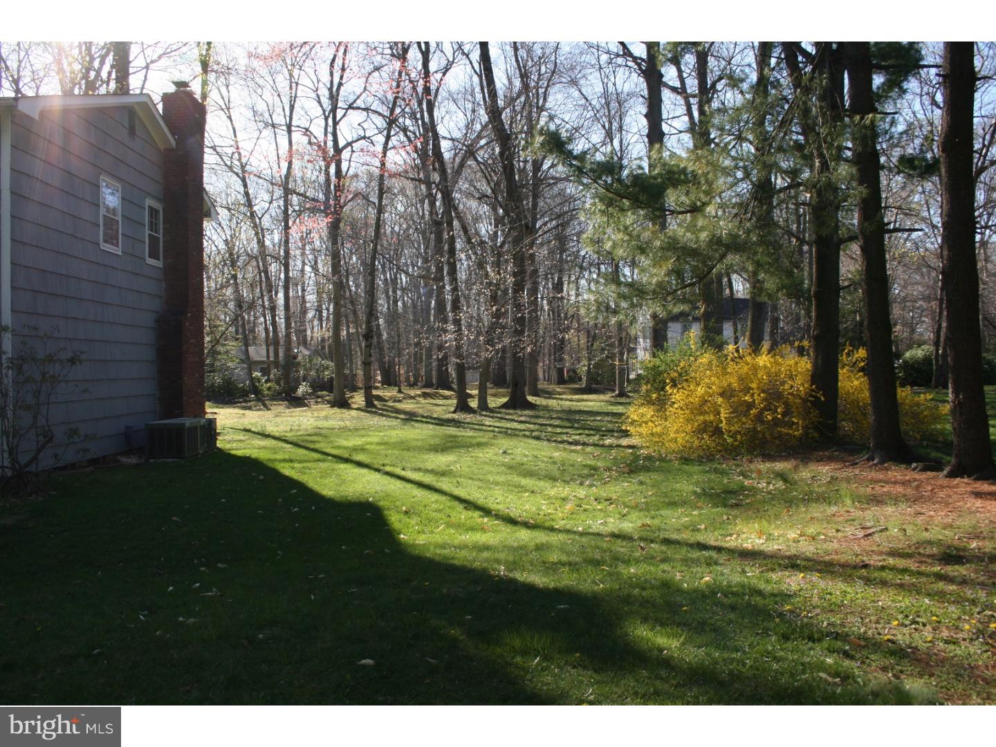 20 Sunset Road Lawrence Township, NJ 08648 - Photo 21 of 25 a swimming pool with wooden fence