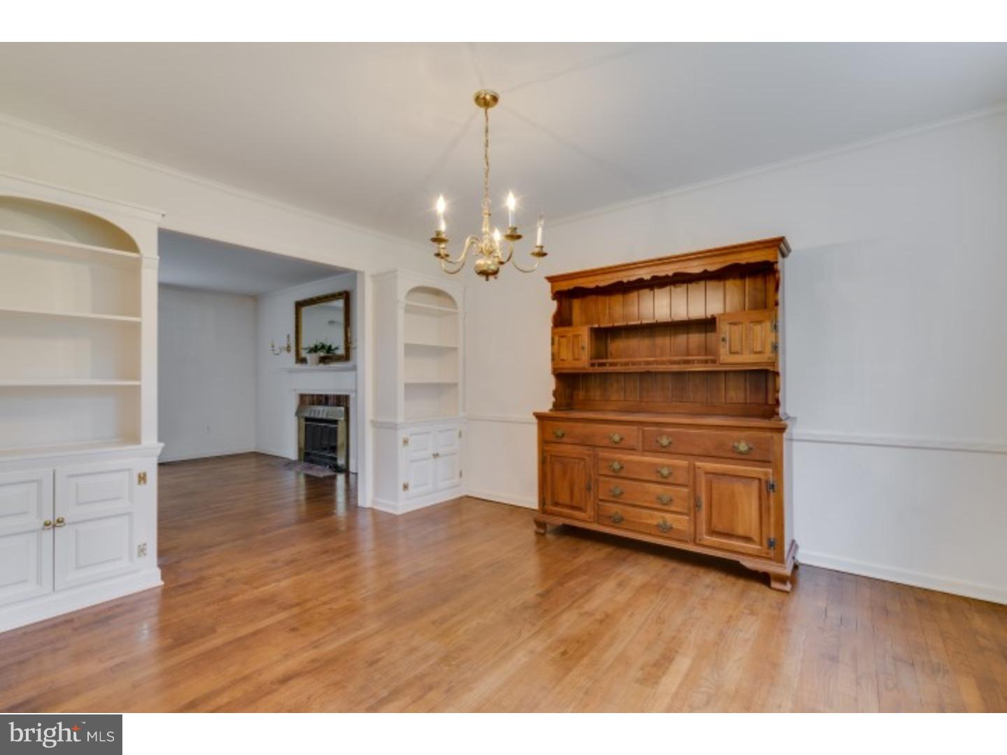 20 Sunset Road Lawrence Township, NJ 08648 - Photo 4 of 25 a room with furniture and wooden floor