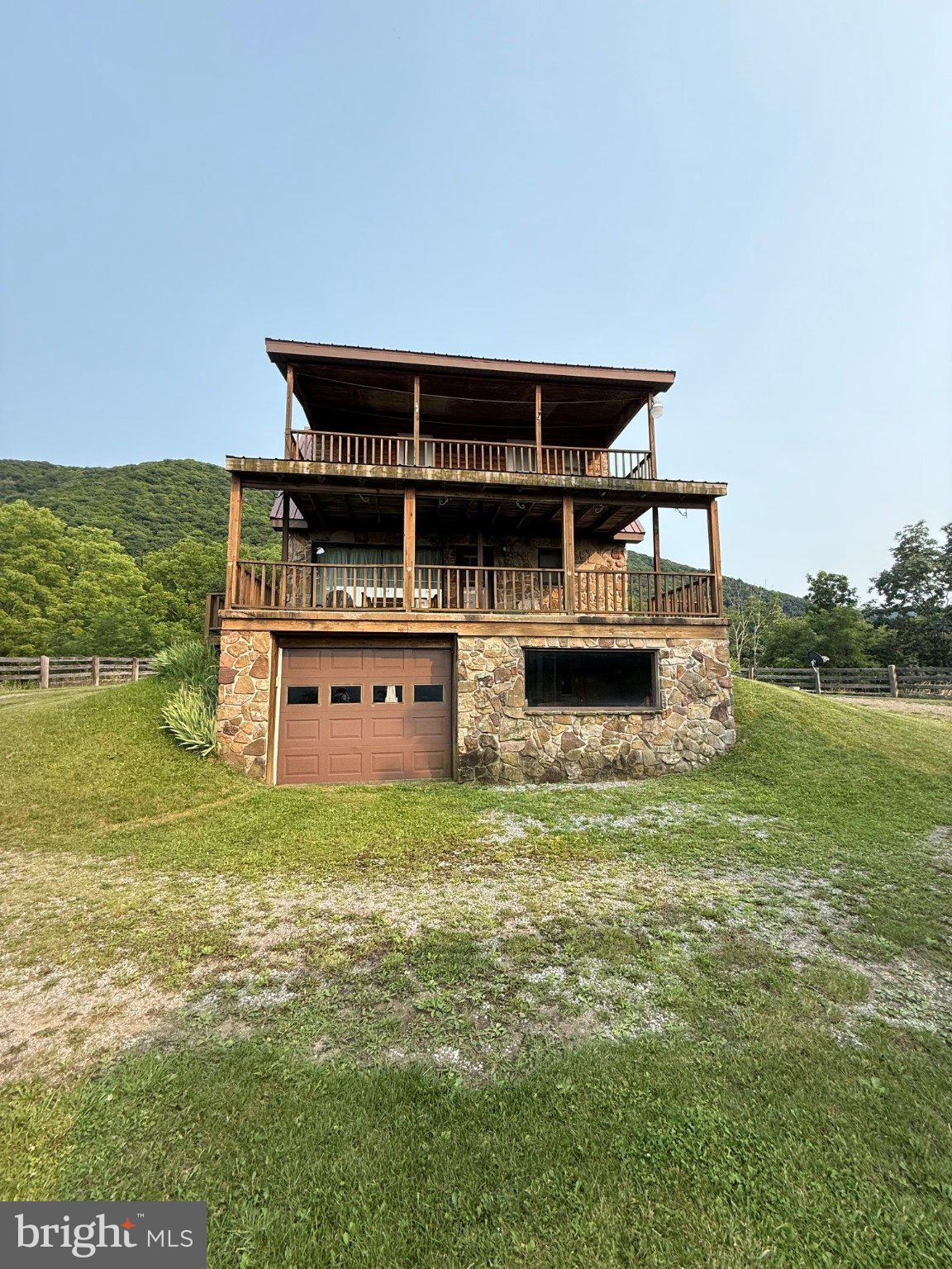1492 Dice Warner Road Circleville, WV 26804 - Photo 4 of 36 Charming hillside retreat with decks.