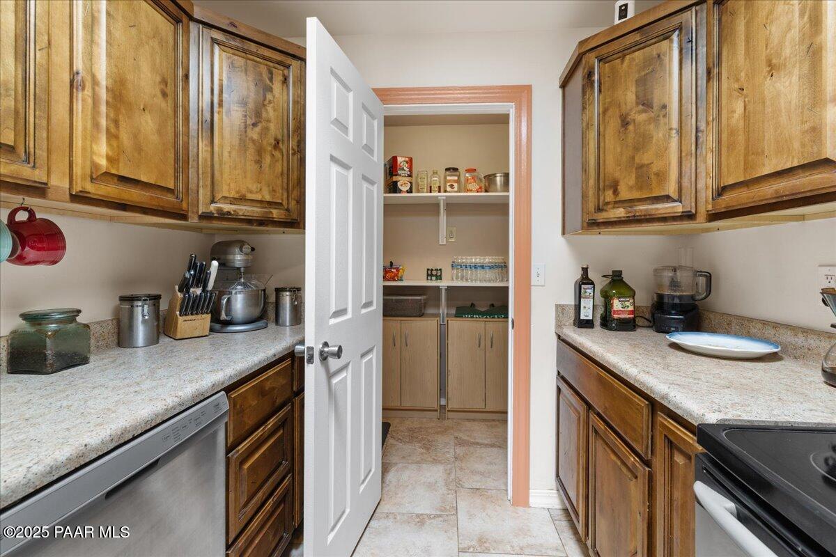 470 South Dewey Road Dewey-Humboldt, AZ 86327 - Photo 7 of 29 a kitchen with stainless steel appliances granite countertop a sink and cabinets