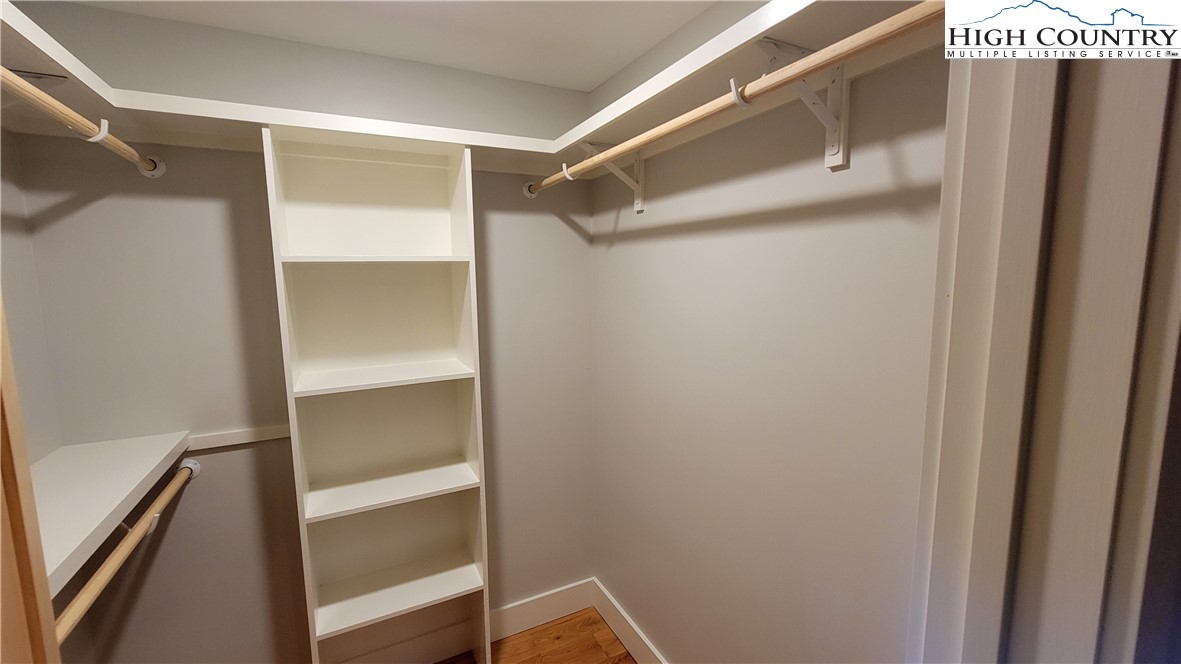 526 Hidden Valley Circle Boone, NC 28607 - Photo 14 of 29 a view of walk in closet with empty racks