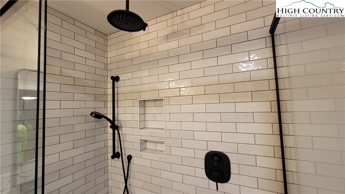 526 Hidden Valley Circle Boone, NC 28607 - Photo 18 of 29 a bathroom with a shower