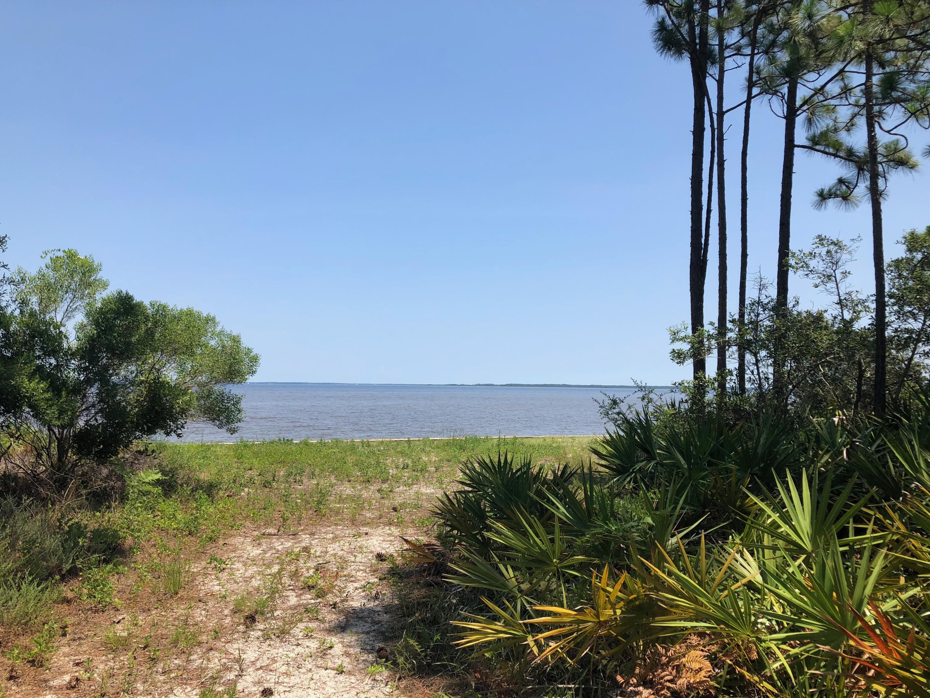 9J Driftwood Point Road Santa Rosa Beach, FL 32459 - Photo 1 of 13 a view of a yard