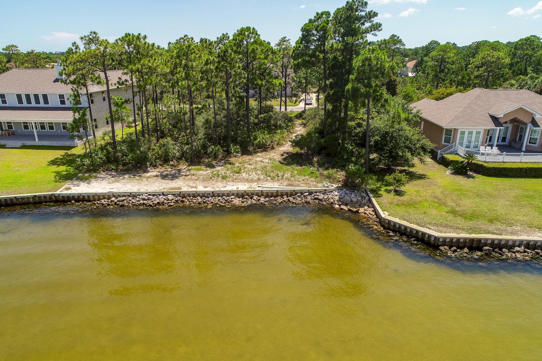 9J Driftwood Point Road Santa Rosa Beach, FL 32459 - Photo 6 of 13 a view of a swimming pool with a lounge chair