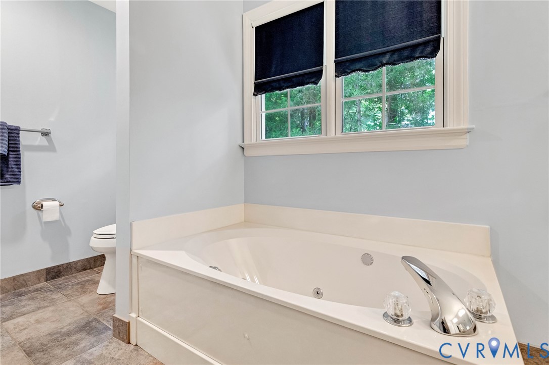 16406 Inchcape Road Moseley, VA 23120 - Photo 41 of 62 Built-in jetted tub with chrome fixtures, tiled fl