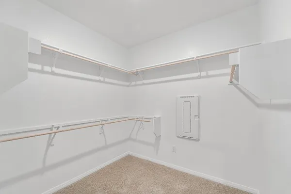 a view of an empty walk in closet